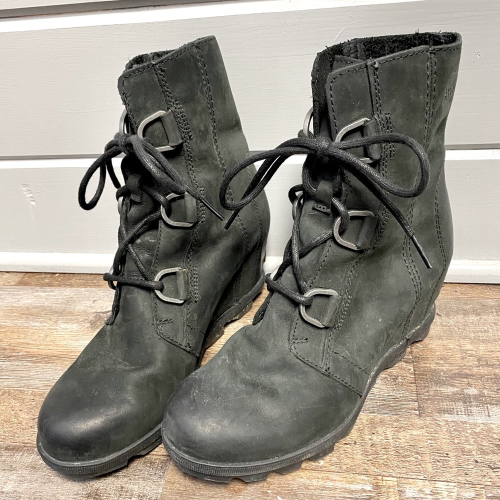 Sorel black boot wedges.